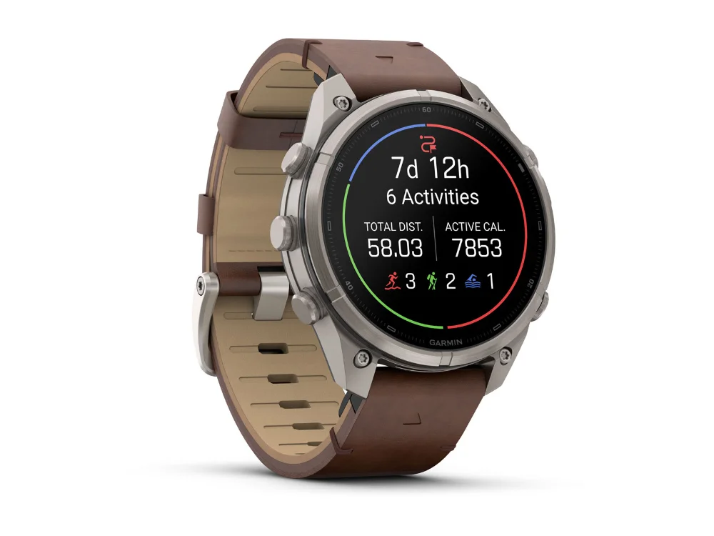 Garmin Fenix 9 Pro inReach 47 mm, титан, коричневый кожаный и силиконовый ремешки — вид сбоку