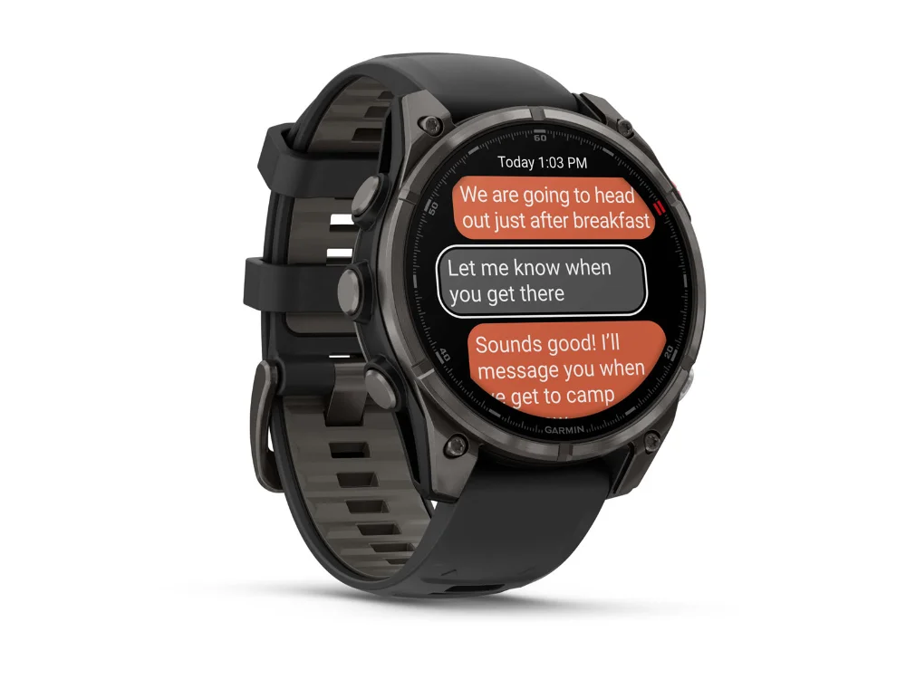 Garmin Fenix 8 Pro AMOLED 47 mm, карбоново-серый титан, чёрный/серый силиконовый ремешок — вид сбоку
