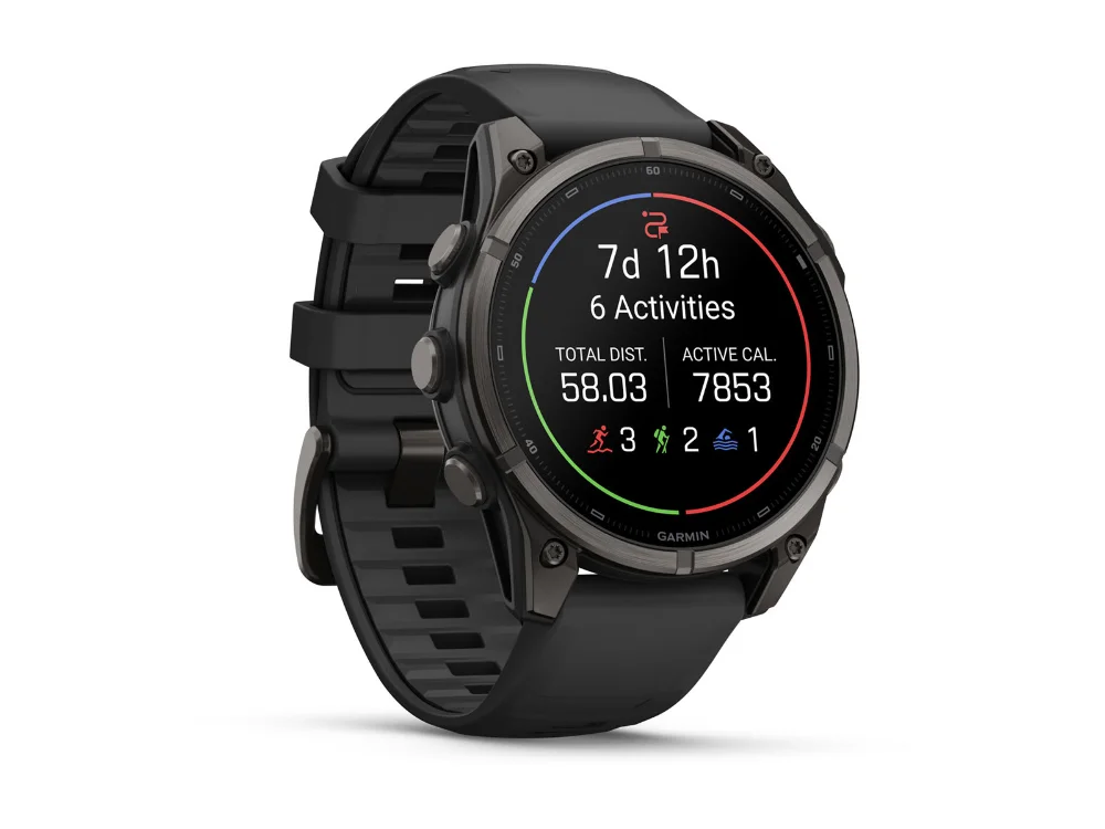Garmin Fenix 9 47 mm, карбоново-серый титан, чёрный силиконовый ремешок — вид сбоку