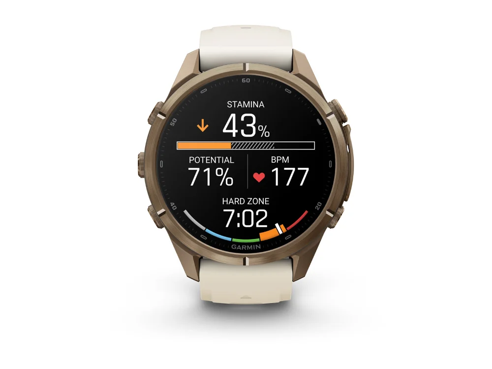 Garmin Fenix 9 Pro inReach 43 mm, золотистый титан, кремовый/серый силиконовый ремешок — вид спереди, другой экран
