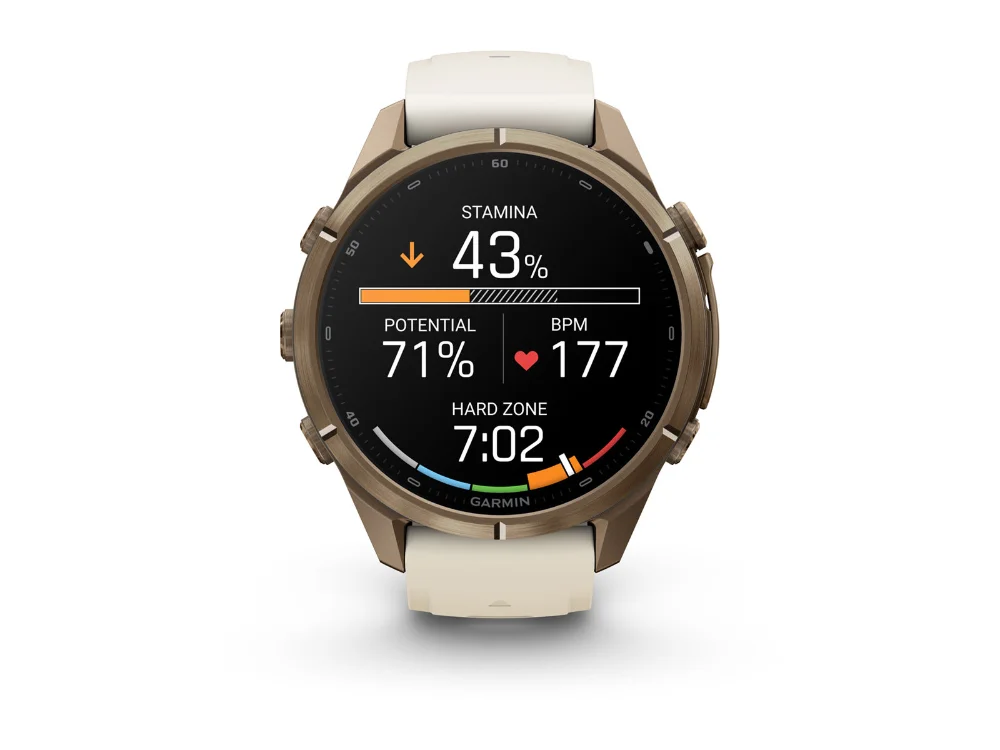 Garmin Fenix 9 Pro 43 mm, золотистый титан, кремовый/серый силиконовый ремешок — вид спереди, другой экран