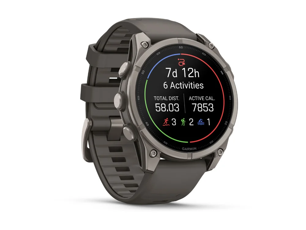 Garmin Fenix 9 47 mm, титан, серый силиконовый ремешок — вид сбоку