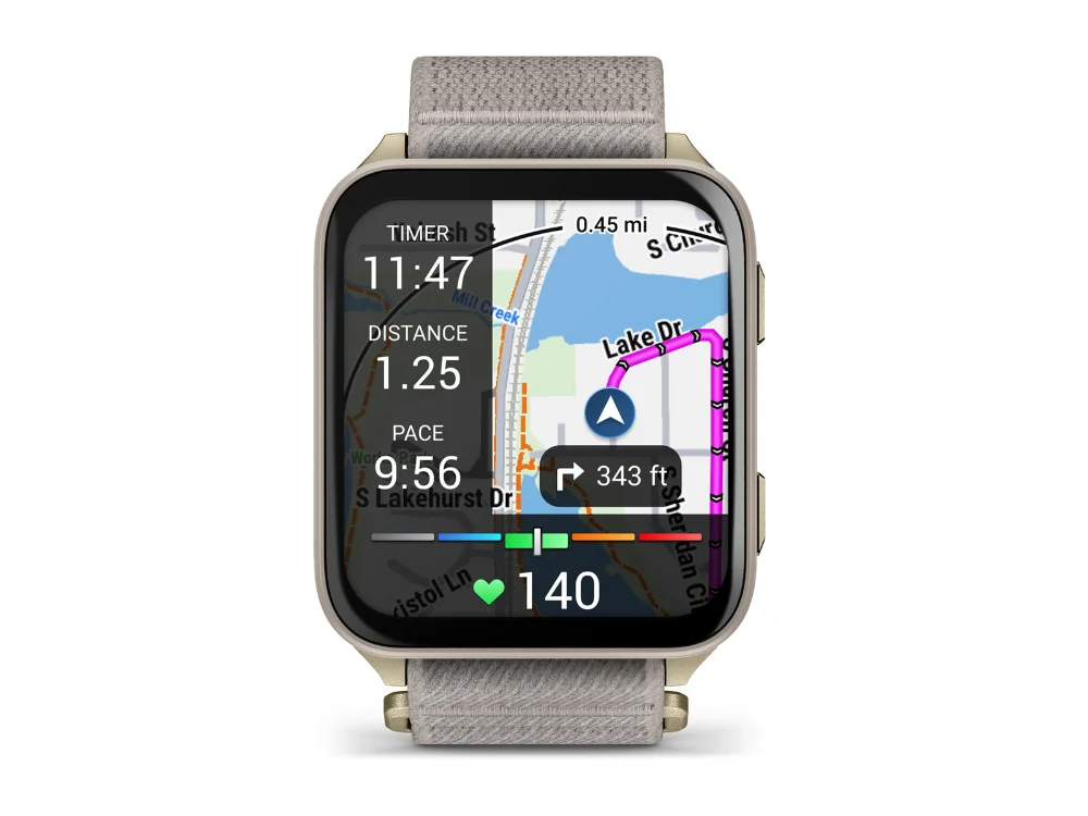 Garmin Venu X1, мягкое золото, светло-серый нейлоновый ремешок — вид спереди