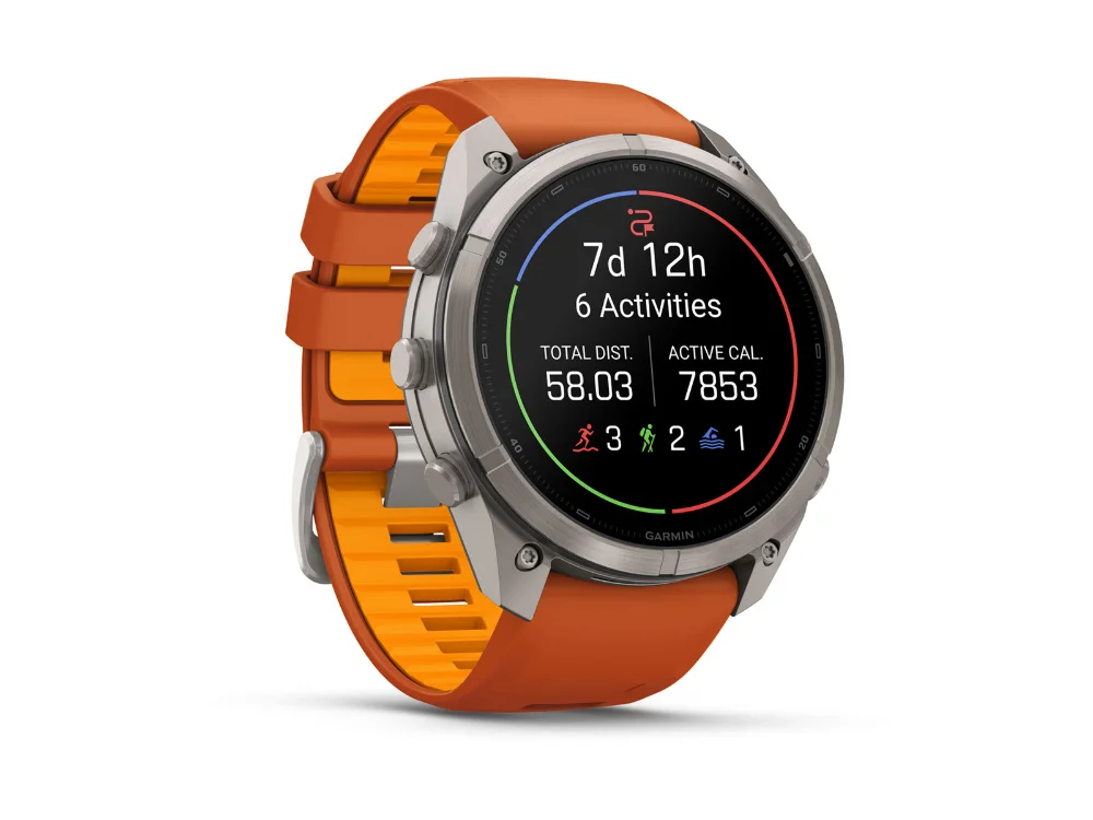 Garmin Fenix 9 Pro inReach 51 mm, титан, оранжевый силиконовый ремешок — вид сбоку